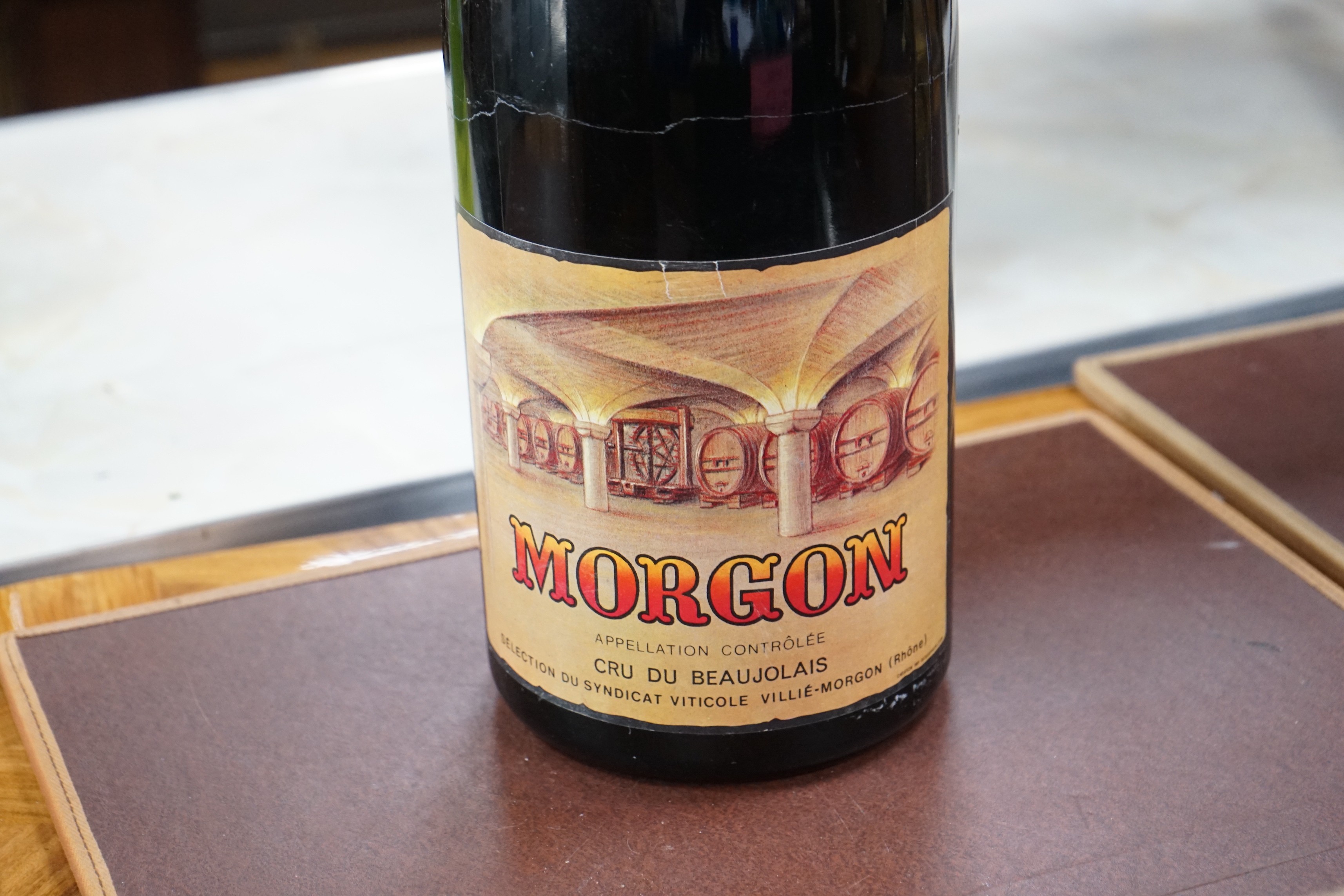 A large bottle of 1974 Morgon Cru de Beaujolais, probably a Mathusalem (6 litres), 58cm